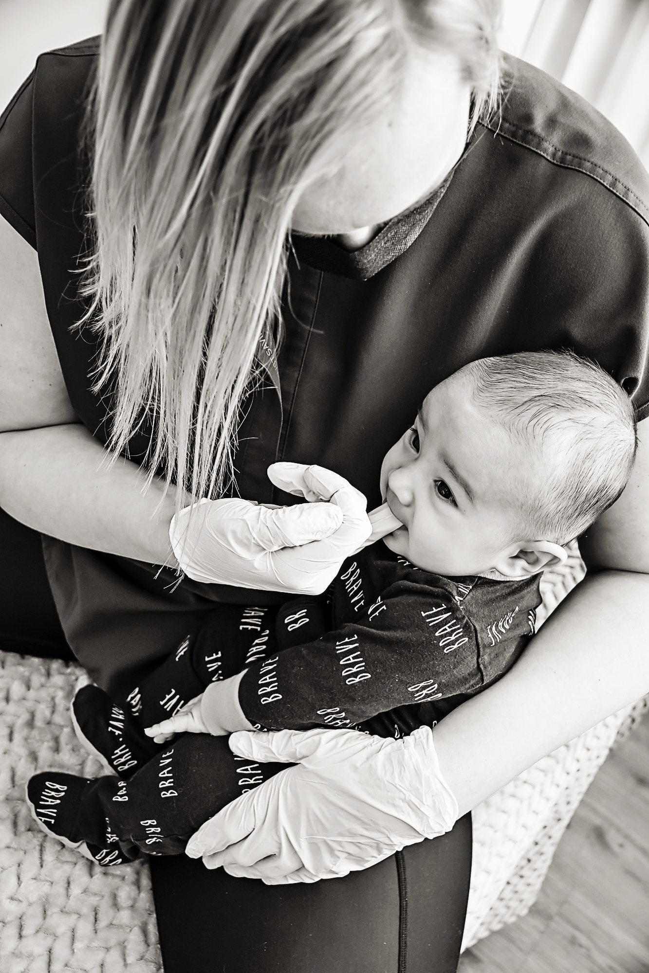 Intraoral treatment on an infant performed by Carrie Jane, Manual Osteopathic Therapist